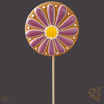 Lila margaréta virágos pálcás mézes sütemény